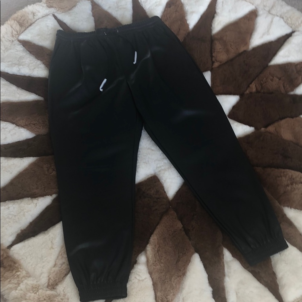 BRAND NEW**ZARA Black faux leather joggers.